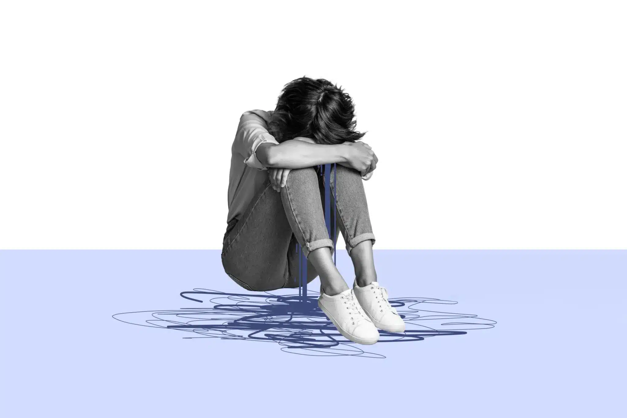 Chica-llorando-abrazadando-sus-piernas